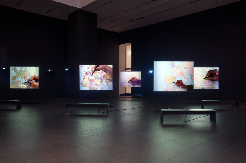 "The Mapping Journey Project". 2008–11. Eight-channel video (color, sound). Installation view, solo exhibition, "Bouchra Khalili: The Mapping Journey Project", The Museum of Modern Art, New York, April 9–October 10, 2016. Photo: Jonathan Muzikar